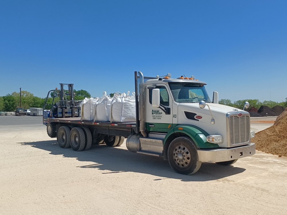 truck with Adkins Materials logo carrying bulk bags